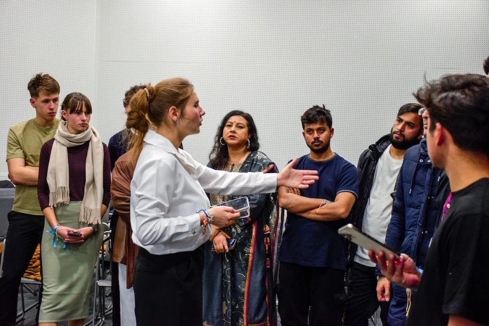 A Lithuanian native leading a speaking activity